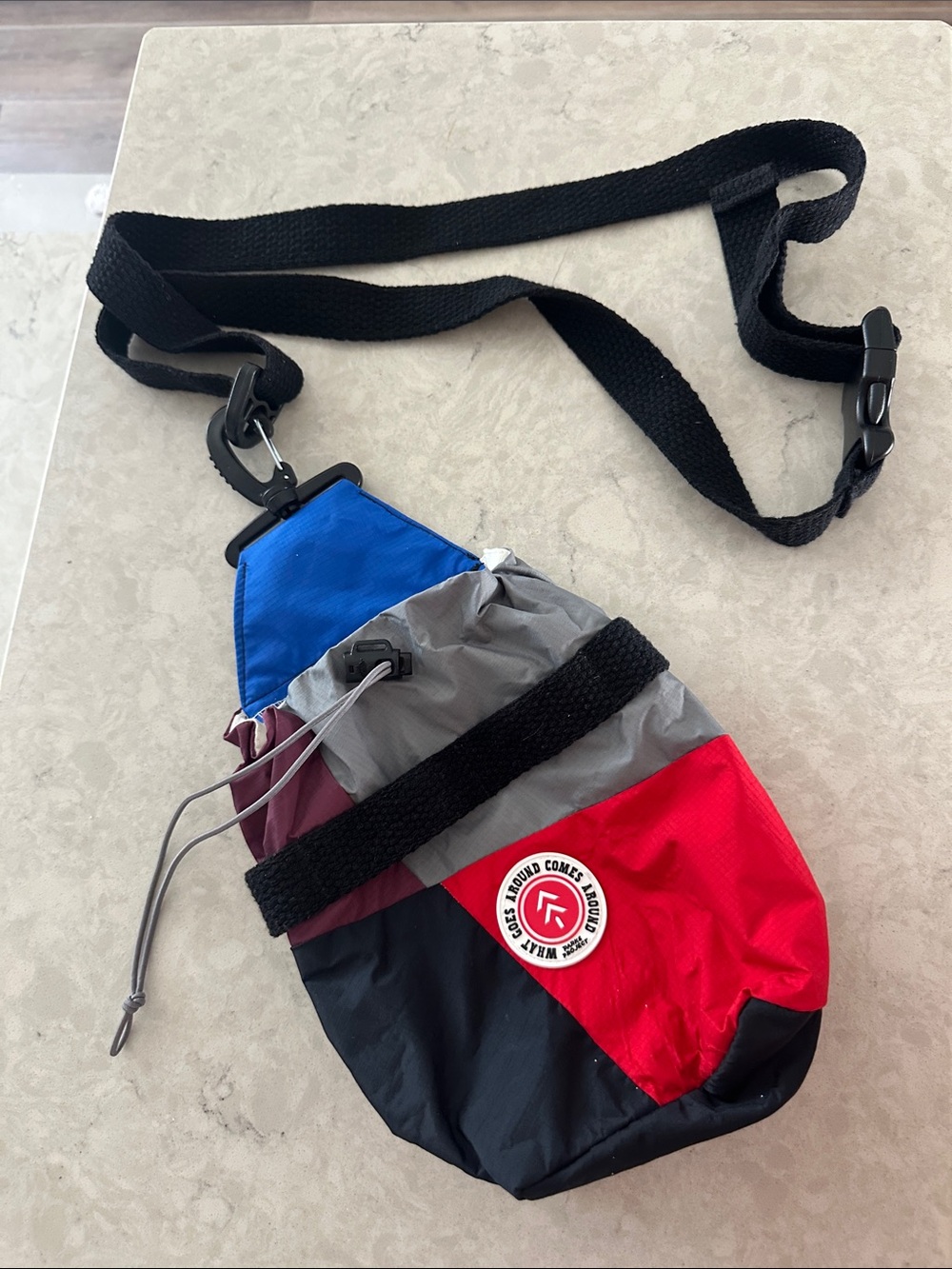 Parks Project What Goes Around Upcycled Water Bottle Sling
